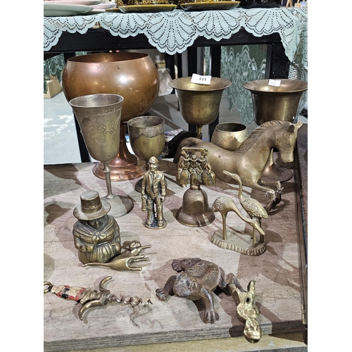 111 - Lovely large selection of brass and copper items including bells, goblets, figurines and so much mor... 