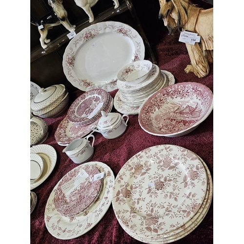 153 - Large selection of decorative pink plates together with Royal Tudor Ware serving bowl. Also a series... 