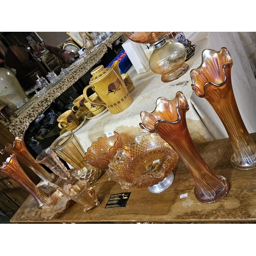 173 - Gorgeous selection of amber coloured lustre glass including vases, bowls and dishes