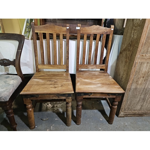 130 - Pair of vintage wooden hall chairs