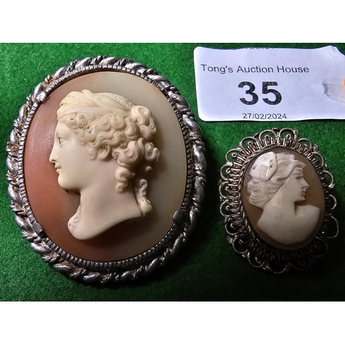 35 - 2 vintage white metal cameo brooches