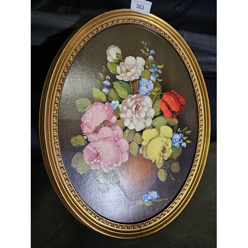 363 - A Fine oil on board bouquet painting by Artist R Rosini still life in oval frame