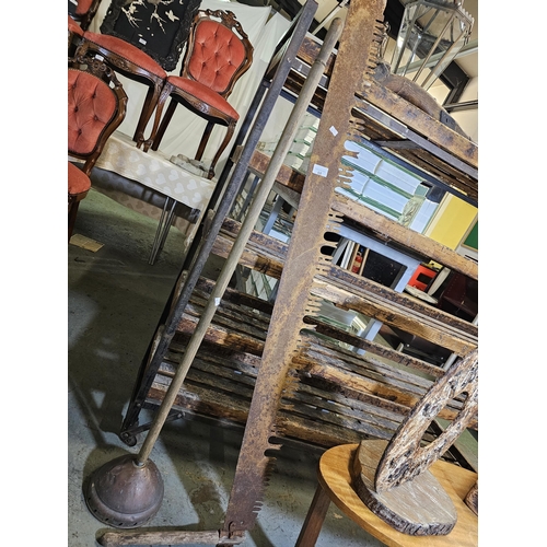 68 - Antique double ended saw and copper washing plunger.