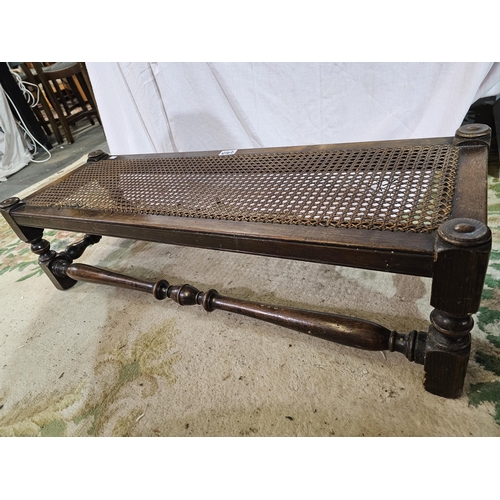 510 - Antique oak rattan long bench with beautiful turned wood detail. 92cm length x 25cm height.