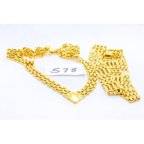 578 - Two gorgeous gold colour necklaces, one signed Napier