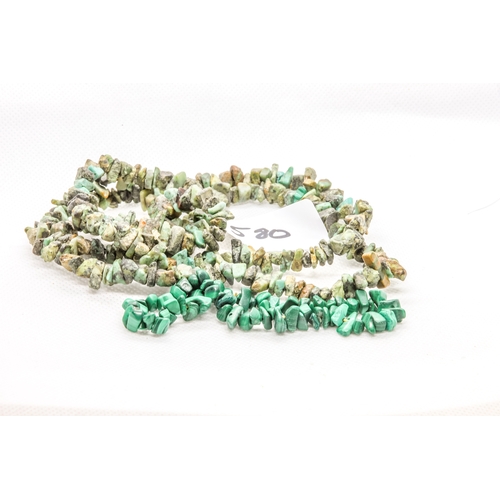 580 - Large malachite necklace together with elasticated malachite gemstone bracelet