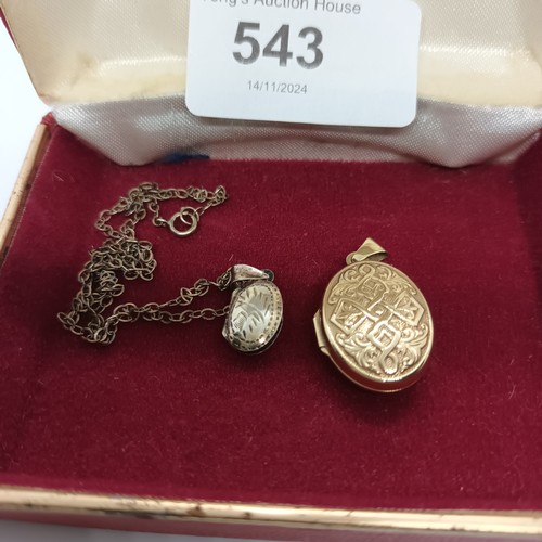 543 - 9ct gold locket and silver locket with chain