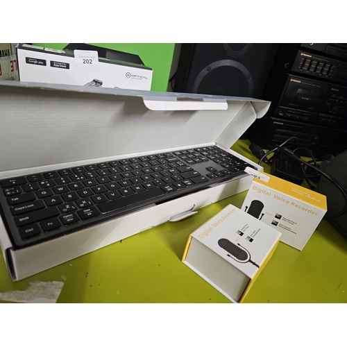 203 - Boxed backlit wireless keyboard mouse combo together with 2 boxed digital voice recorders