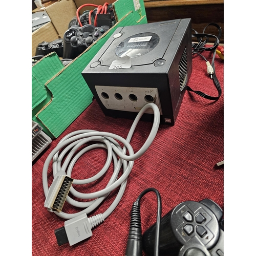 265 - NINTENDO GAMECUBE with cables and adapters