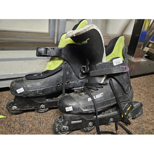 278 - Pair of BAUER roller blades, approx size 11