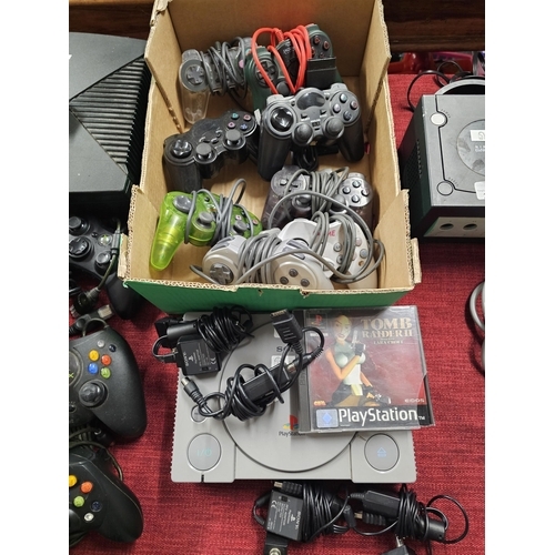 264 - PLAYSTATION CONSOLE, plus large collection of controllers, cables, TOMB RAIDER GAME