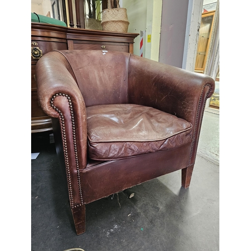 512 - Light brown distressed studded leather bucket tub chair armchair
