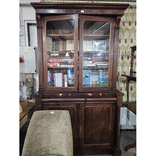 1030 - Wooden dresser with glass panelled doors over twin cupboards. Approx 124 x 215cm