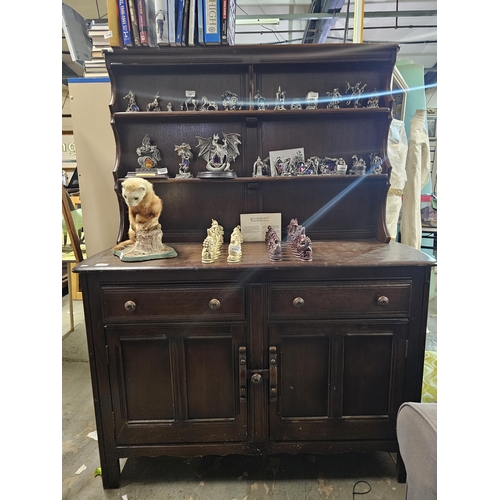 1082 - Sturdy dark wood dresser with display shelves and 2 drawers over 2 cupboards