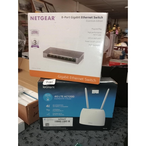 1191 - Brand new in box Netgear 8 port gigabit Ethernet switch together with a new ioGiant 4GLTE AC1200 dua... 