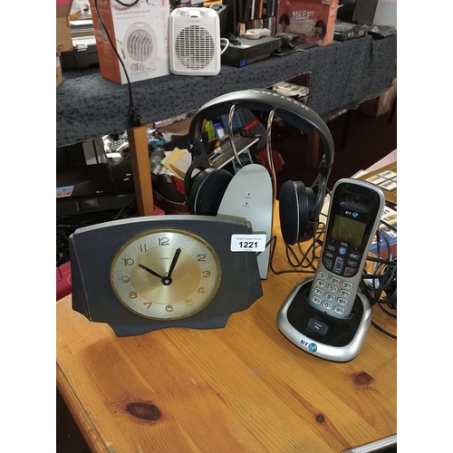 1221 - Sennheiser headphones with stand together with BT cordless phone and a battery operated mantle clock