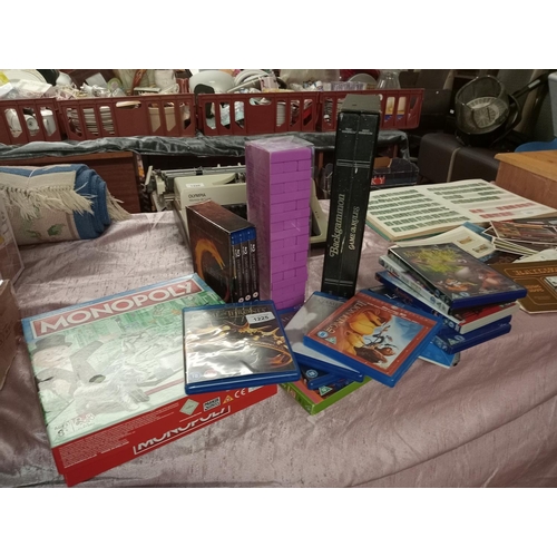 1225 - Games and DVD collection to include Monopoly, Backgammon, a selection of blu-ray and DVD films and t... 