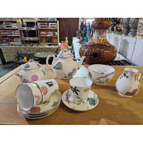 28 - Collection of Royal Worcester cups and saucers, tea pot, sugar bowl and milk jug