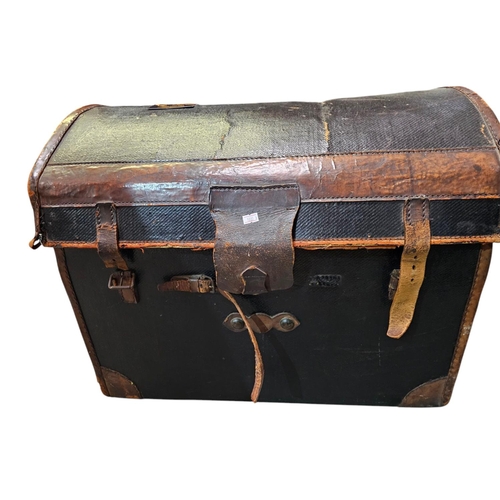 118 - Large curved top travelling trunk with leather straps