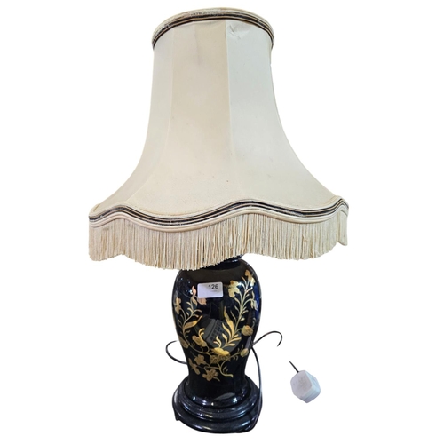 126 - Gloss black ceramic lamp base with golden flower decoration, complete with shade