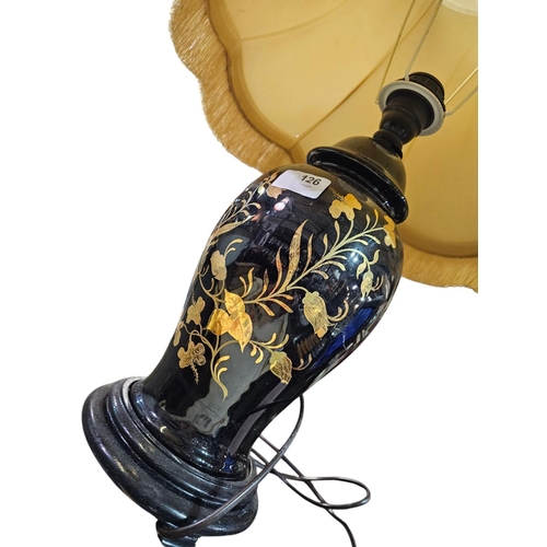 126 - Gloss black ceramic lamp base with golden flower decoration, complete with shade