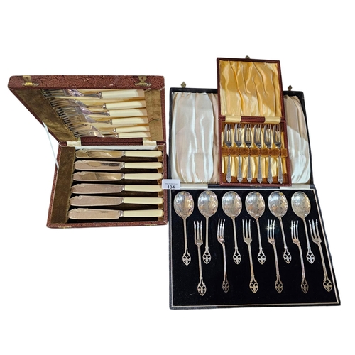 134 - Three assorted vintage canteens of cutlery to include fish knives & forks and dessert forks