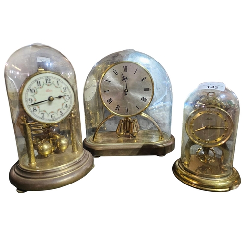 142 - Collection of 3 glass domed mantle clocks