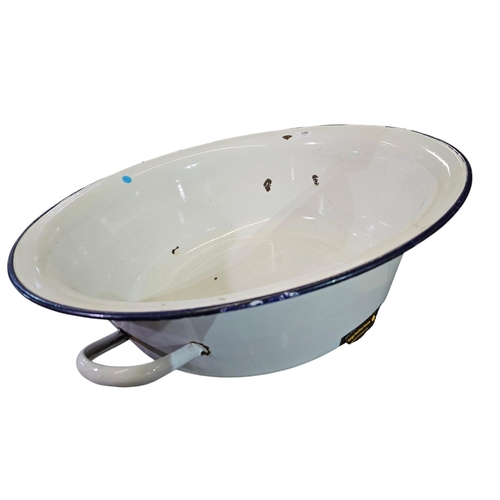 128 - Large oversized enamel basin with handles. Approx 64cm across.