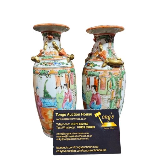 145 - Pair of Chinese handpainted vases, standing approx 16cm tall