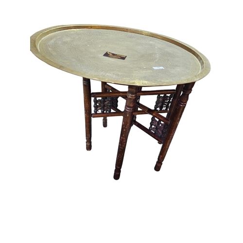 58 - Large Indian folding table with a brass tray top