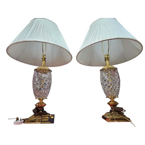 66 - Pair of matching glass and metal table lamps standing approx 50cm tall