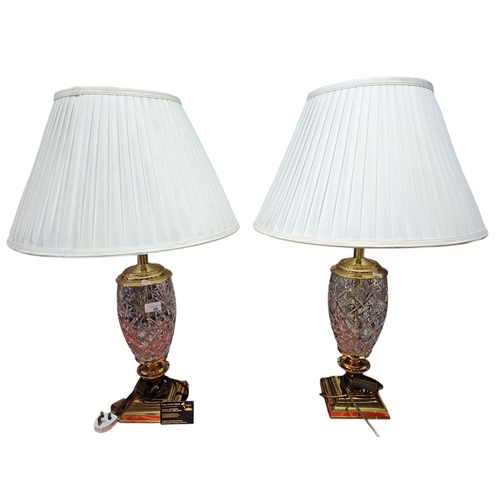 66 - Pair of matching glass and metal table lamps standing approx 50cm tall