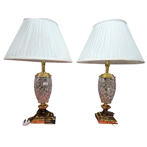 66 - Pair of matching glass and metal table lamps standing approx 50cm tall