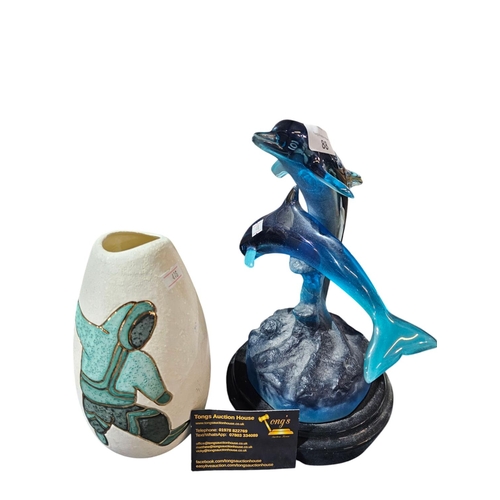 88 - Resin model of dolphins together with a ceramic vase with a dancing figure