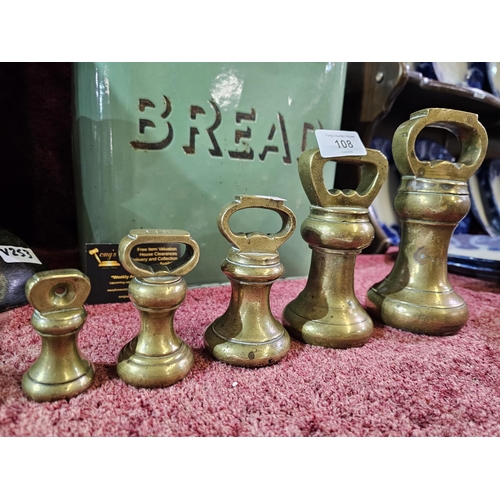 108 - Set of 5 brass weights from 8oz to 7lbs