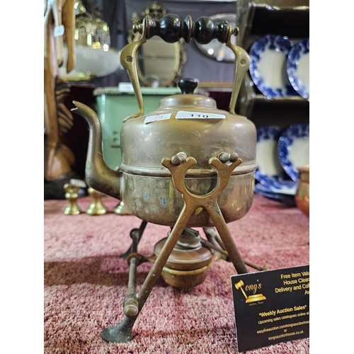 110 - Small brass kettle on stand