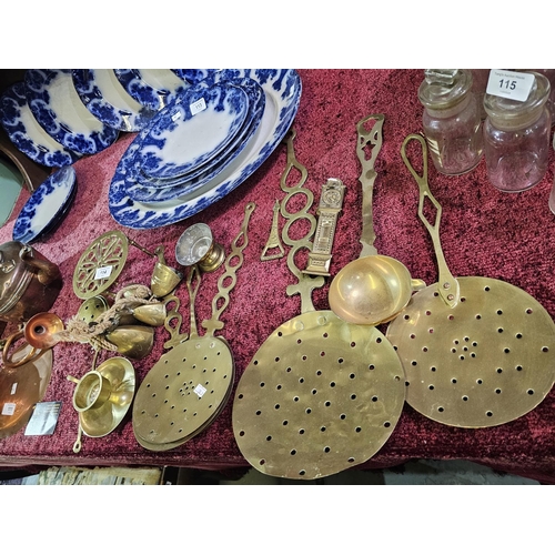 114 - Large selection of vintage brass to include candle holder, trivet, bowl and many more