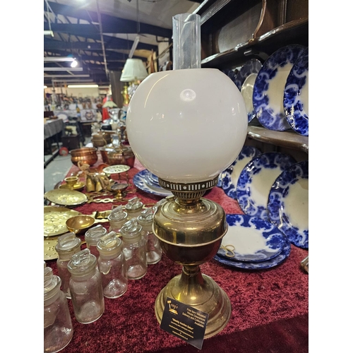 116 - Brass oil lamp with white glass shade