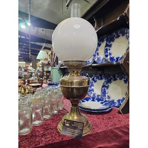 116 - Brass oil lamp with white glass shade