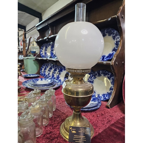 116 - Brass oil lamp with white glass shade