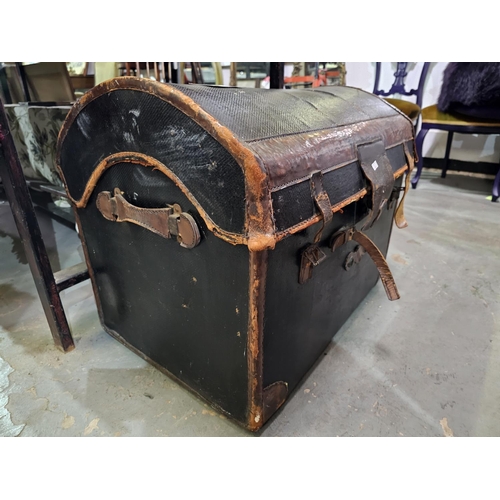 118 - Large curved top travelling trunk with leather straps