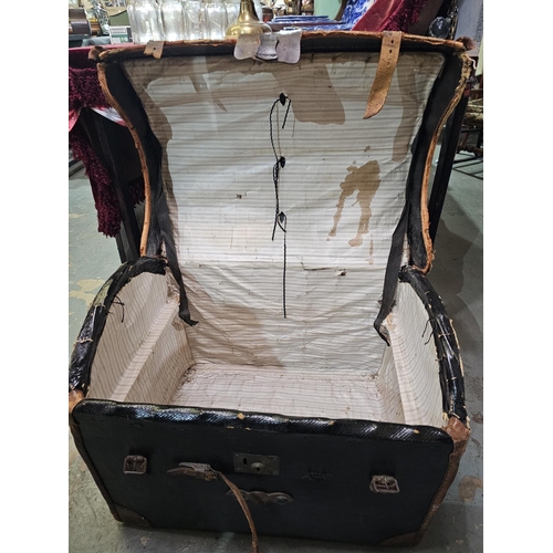 118 - Large curved top travelling trunk with leather straps