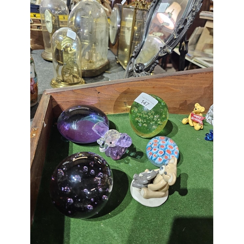 147 - Collection of 4 round glass paperweights together with a decorative glass elephant and a Julia Franc... 