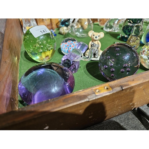 147 - Collection of 4 round glass paperweights together with a decorative glass elephant and a Julia Franc... 