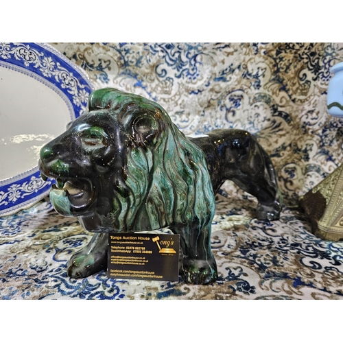 47 - A vintage Blue Mountain Pottery lion figurine, likely made in Canada