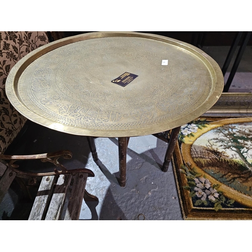 58 - Large Indian folding table with a brass tray top