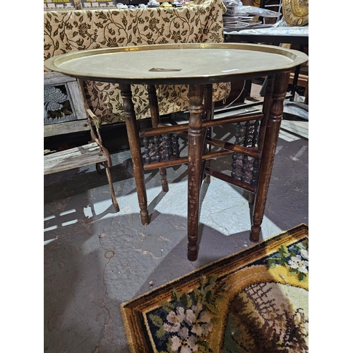 58 - Large Indian folding table with a brass tray top