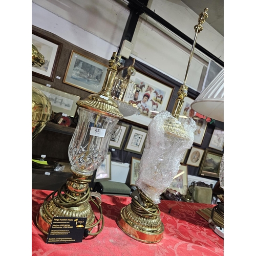 65 - Pair of engraved glass and metal lamp bases standing approx 48cm tall.