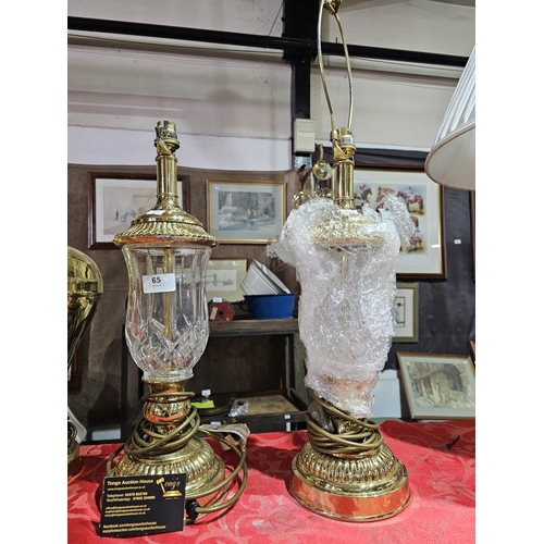 65 - Pair of engraved glass and metal lamp bases standing approx 48cm tall.