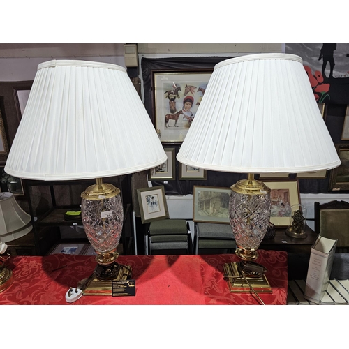 66 - Pair of matching glass and metal table lamps standing approx 50cm tall